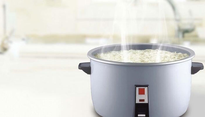 教你如何电饭煲煮饭避免米汤外溢